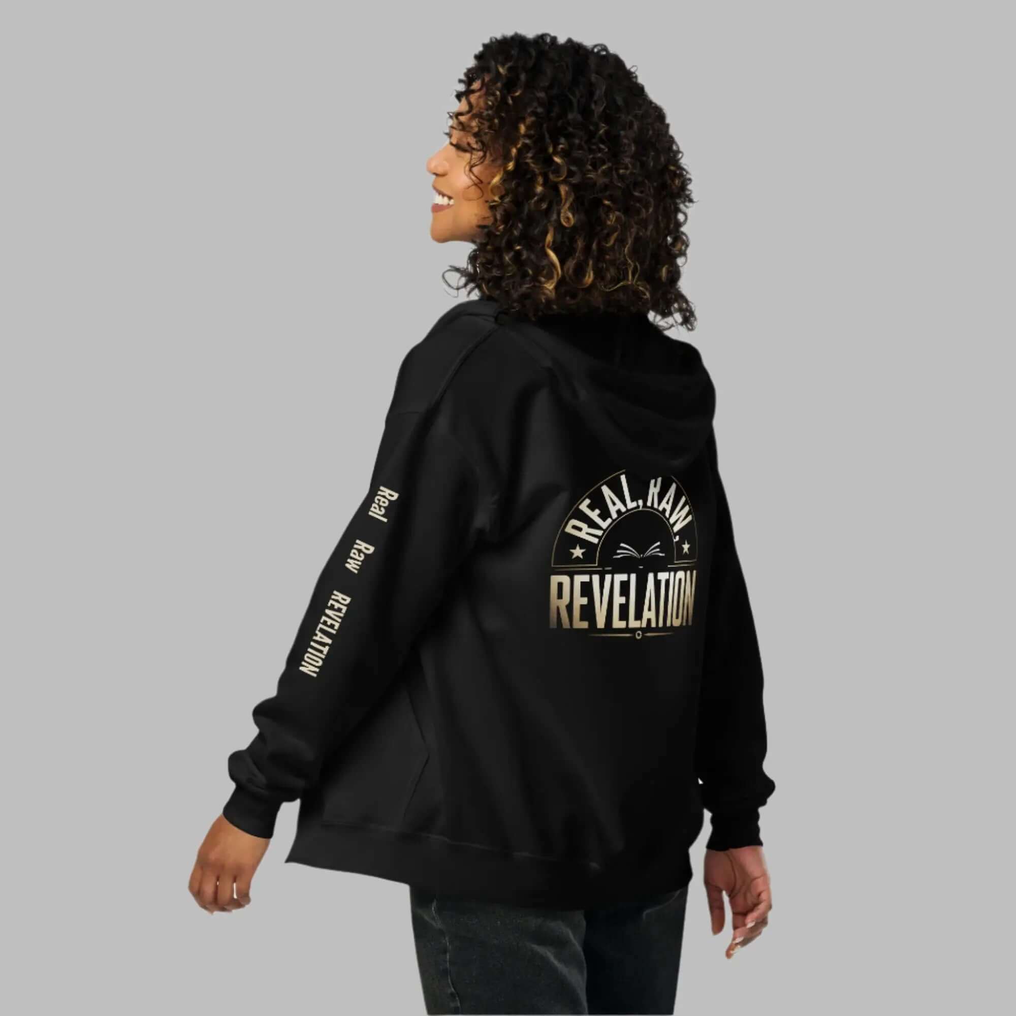 Revelation unisex heavy blend zip hoodie in black, featuring bold Christian message on the back, warm and stylish faith-based apparel