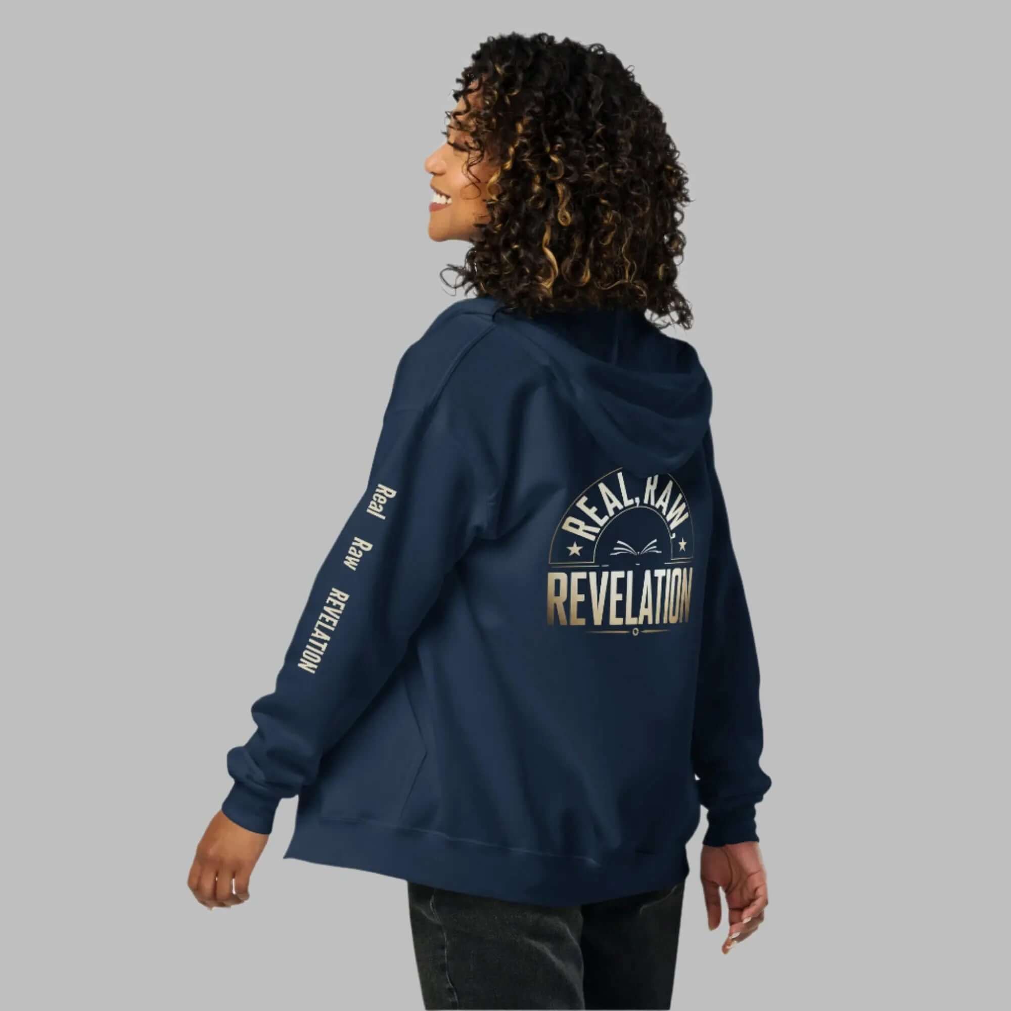 Revelation unisex heavy blend zip hoodie in black, featuring bold Christian message on the back, warm and stylish faith-based apparel